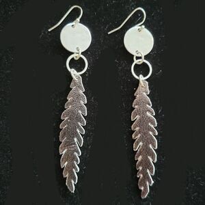 Faux leather feather earrings. Fashion jewelry. Statement jewelry. NWOT